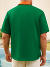 Maxcorners Orange And Green St. Patrick's Day Lucky Clover Hawaiian Golf Shirt, Tropical Vibe Men's Golf Shirt
